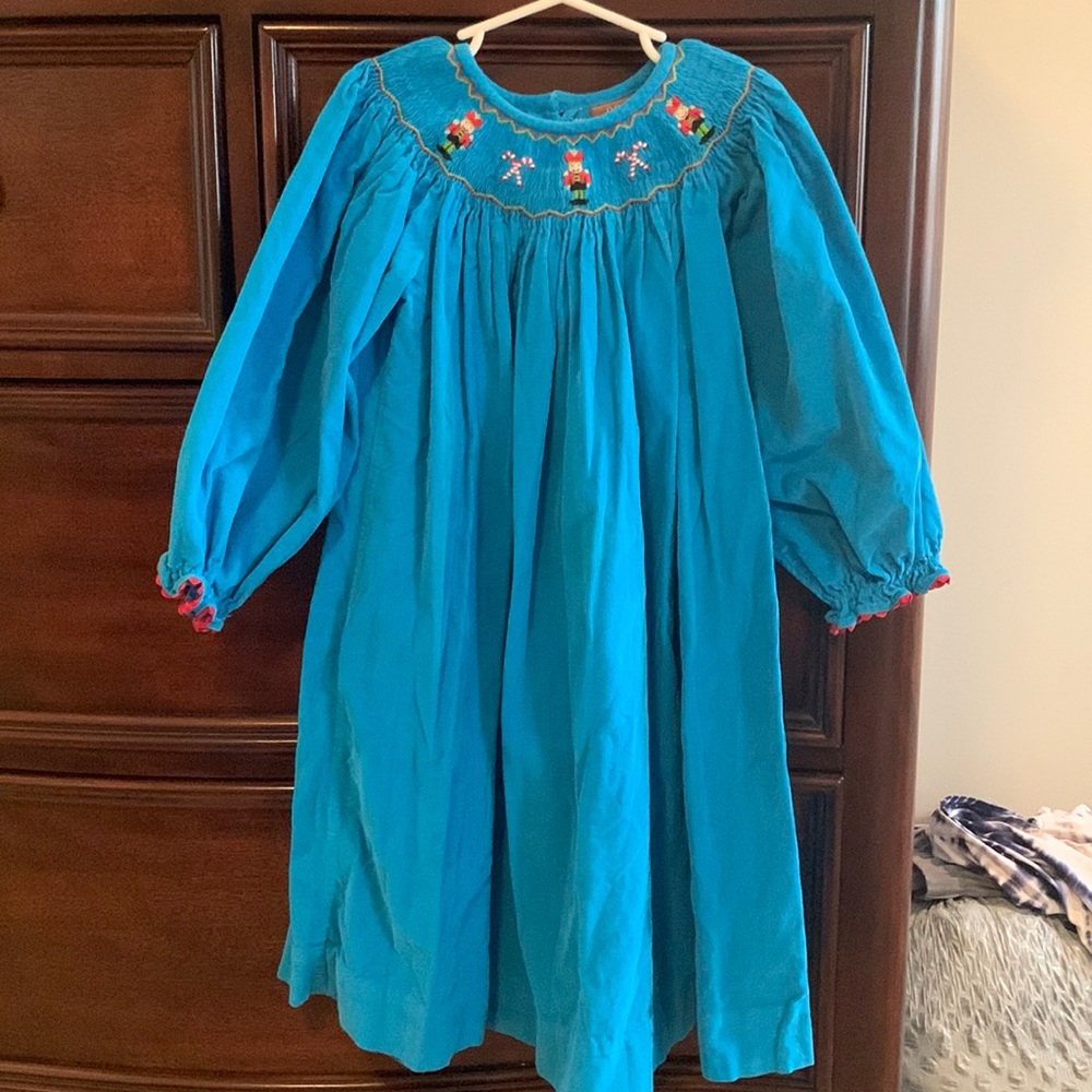 Christmas dress with toy soldier and candy cane smocking